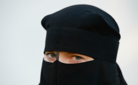 German Restaurant suffers backlash for throwing out veiled woman