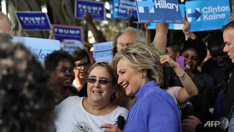 US polls narrow as Clinton grapples with email fallout