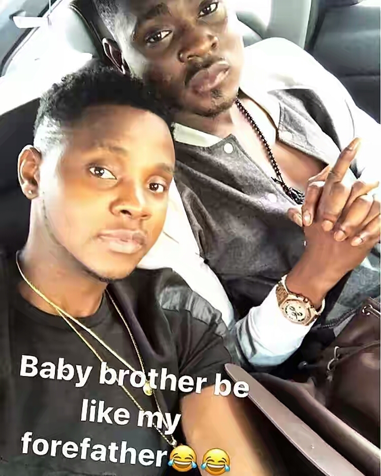 Checkout This Photo Of Kiss Daniel’s Younger Brother Who Looks Way Older Than Him