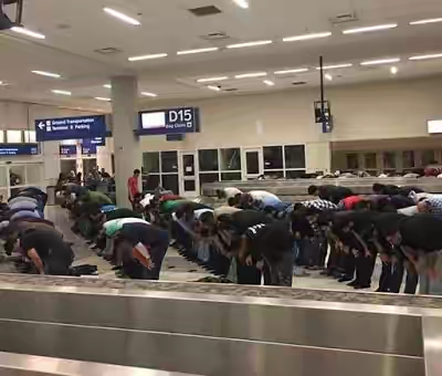 Muslims pray in Dallas Airport to protest Donald Trump’s ban of seven Muslim countries from entering the US