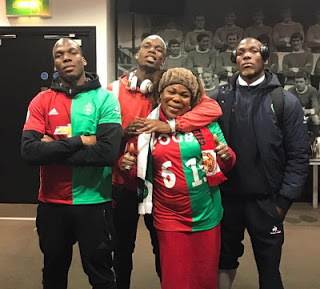 Paul Pogba’s mum supports her two sons as they played against each other