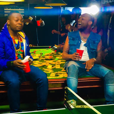 Olamide Disagrees With Davido Over “We Rise By Lifting Others” Mantra